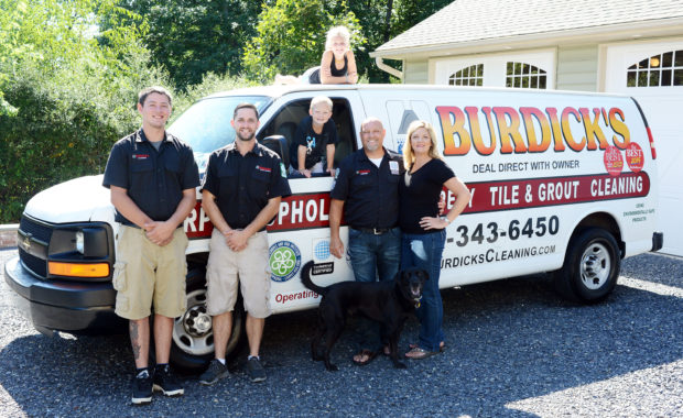 The staff at Burdick's Cleaning pose for a photo August 21, 2015 in Sellersville, Pennsylvania. (Photo by William Thomas Cain)